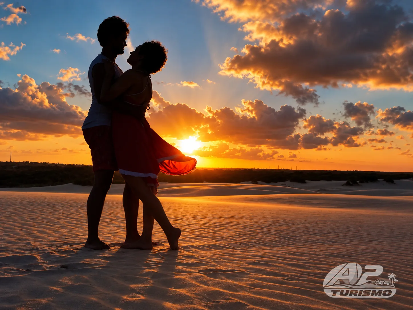 Casal contemplando o pôr do sol nas dunas